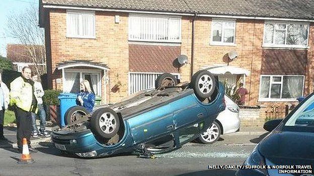 Man injured in Lowestoft as car ends up on roof - BBC News