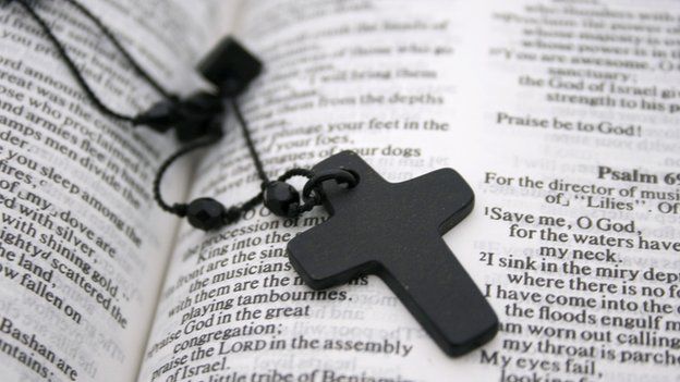 A cross on a bible