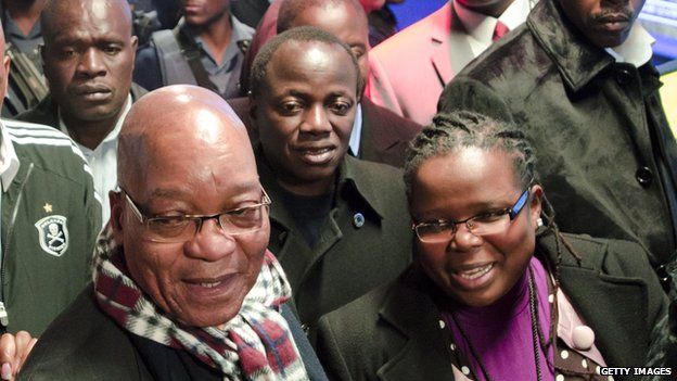 Collins Chabane pictured behind President Jacob Zuma in June 2012