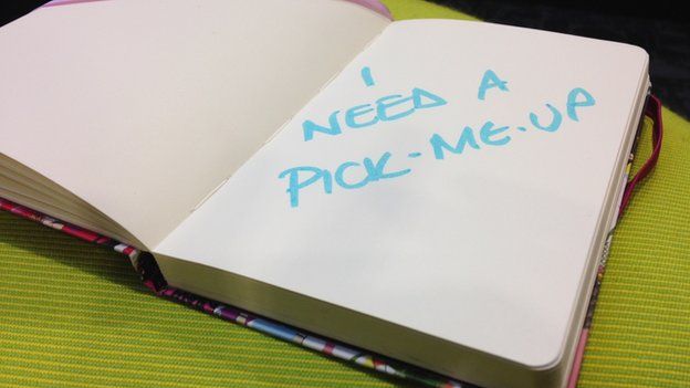 journal with words I need a pick-me-up written inside