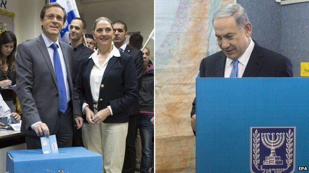 Yitzhak Herzog (l) and PM Benjamin Netanyahu (r) casting votes, 17 March 2015