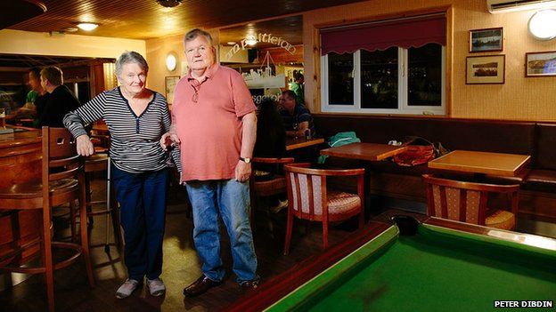 Mary and Alistair Johnston pictured in the Am Politician pub, Eriskay