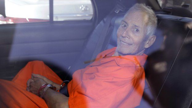 Robert Durst in the back of a car after his arraignment on Tuesday, 17 March 2015