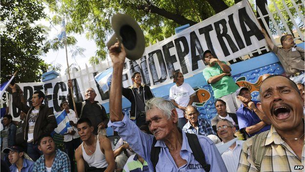 Demonstrators take part in a march against the construction of an inter-oceanic canal in Managua on 10 December, 2014