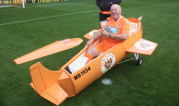 Malcolm Brocklehurst in his aeroplane shaped coffin