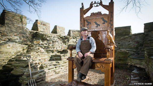 Sculptor Paul Clarke with his 9ft Eisteddfod chair