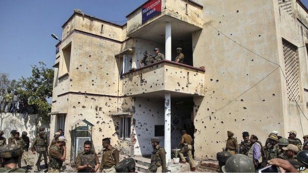 Bullet marks from a rebel attack are seen on the walls of Rajbagh police station in Kathua district on March 20, 2015.