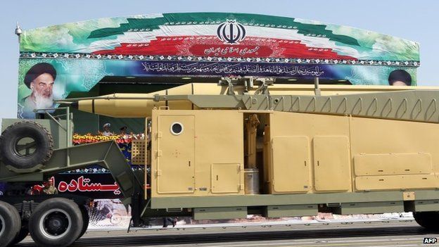An Iranian Sejil ballistic missile is moved through Tehran during a military parade (22 September 2013)