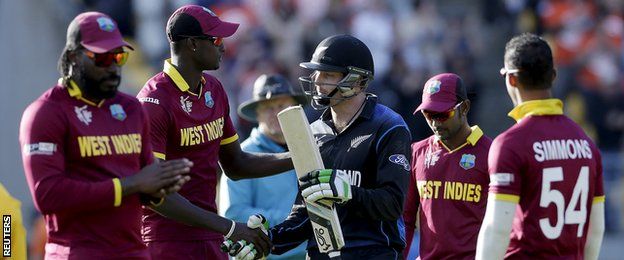 Martin Guptill shakes hands with West Indies captain Jason Holder