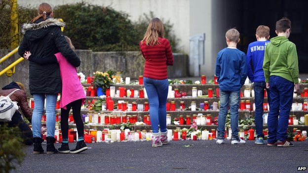 Students father at memorial for pupils of Joseph-Koenig school in Haltern who died in crash