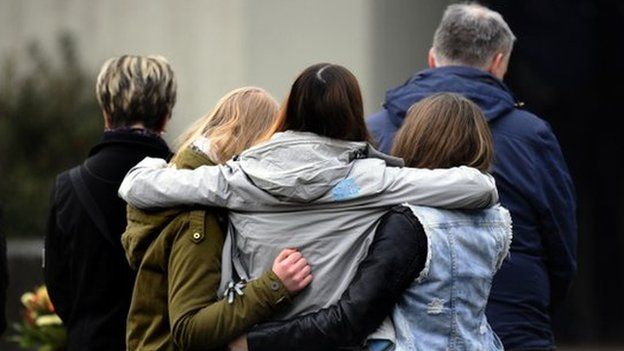 Students hug each other at Joseph Koenig school. Photo: 25 March 2015