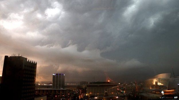 Storm clouds gather over downtown Tulsa