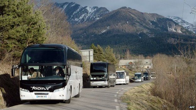 Buses transporting the families of the Germanwings Airbus A320 victims arrive in Seyne-les-Alpes on Thursday