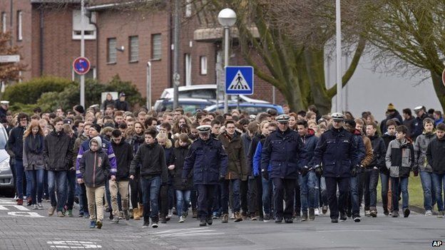 Students of the Joseph-Koenig Gymnasium arrive for a memorial service in Haltern, Germany, on Friday