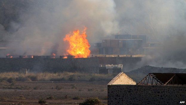 Flames and smoke at an arms depot in Yemen's second city, Aden, 28 March