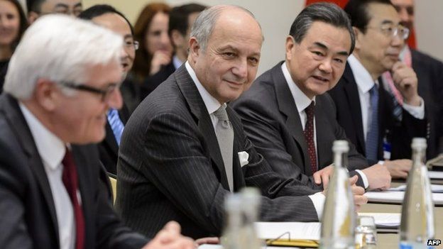 (L to R) German Foreign Minister Frank-Walter Steinmeier, French Foreign Minister Laurent Fabius and Chinese Foreign Minister Wang Yi attend a meeting in Lausanne, 29 March 2015