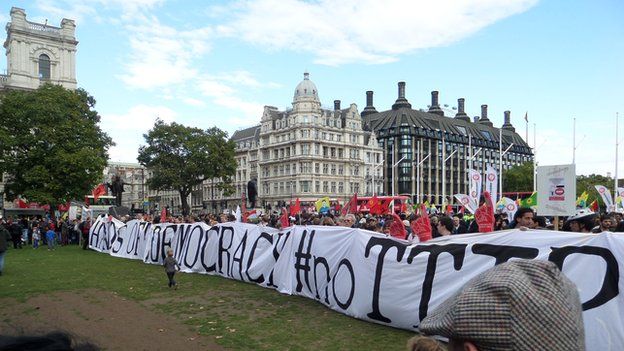 Protesters in London demonstrating against TTIP