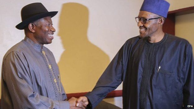 File photo: Goodluck Jonathan (left) and Muhammadu Buhari shake hands after signing a peace deal agreeing to respect the outcome of the polls