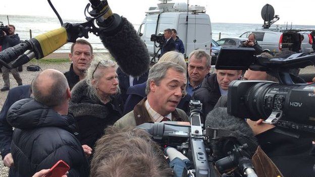 Media flock around Nigel Farage