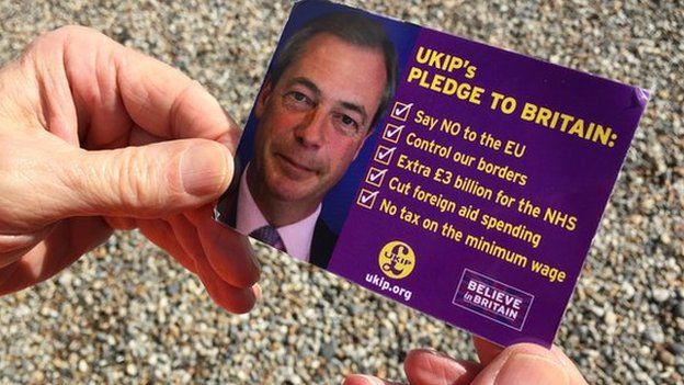 A Ukip pledge card featuring Nigel Farage's face