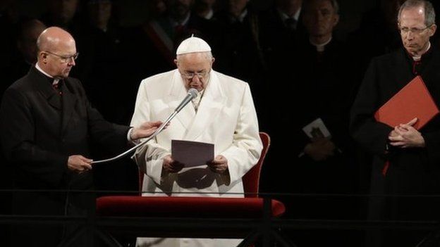 Pope Francis delivers his speech in front of the Colosseum during the Via Crucis (Way of the Cross) torchlight procession on Good Friday in Rome