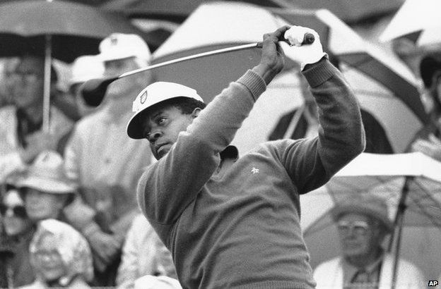 Lee Elder tees off in the first round of play at the Masters in Augusta in 1975