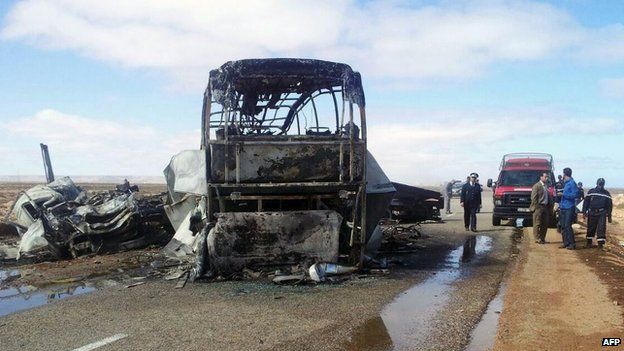 Remains of the burnt-out bus near Tan-Tan, Morocco, on 10 April 2015