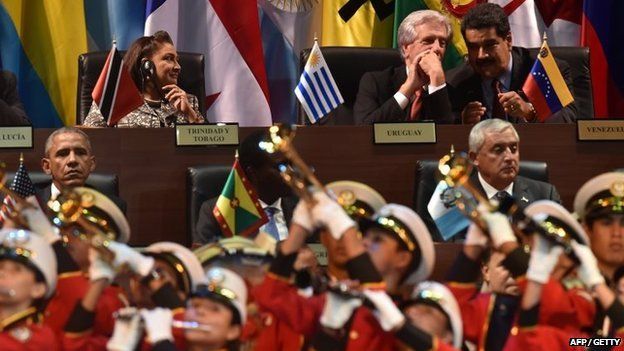 Trinidad and Tobago's Prime Minister Kamla Persad-Bissessar, Uruguay's President Tabare Vazquez and Venezuela's President Nicolas Maduro and US President Barack Obama, Grenadian Prime Minister Keith Mitchell and Guatemala's Otto Perez attend the opening ceremony of the Americas Summit in Panama City on 10 April 2015.