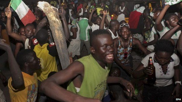 Nigerians celebrate over the declaration of Dayrius Ishaku as the winner of the governorship election in Jalingo, Taraba state, Nigeria, 13 April 2015