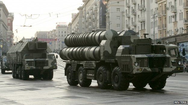 Russian S-300 anti-missile rocket systems move along a central street during a rehearsal for a military parade in Moscow - 2009 file photo