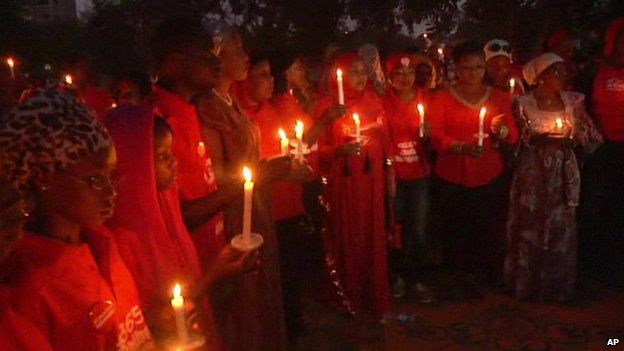 People at a candlelit vigil marking the anniversary of the abductions in Abuja, Nigeria, 14 April 2015