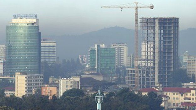 A construction crane stands among office buildings over the city centre in Addis Ababa, Ethiopia - March 2013
