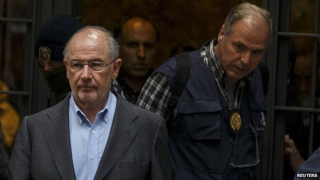 Rodrigo Rato is escorted from his home by investigators, Madrid, 16 April 2015