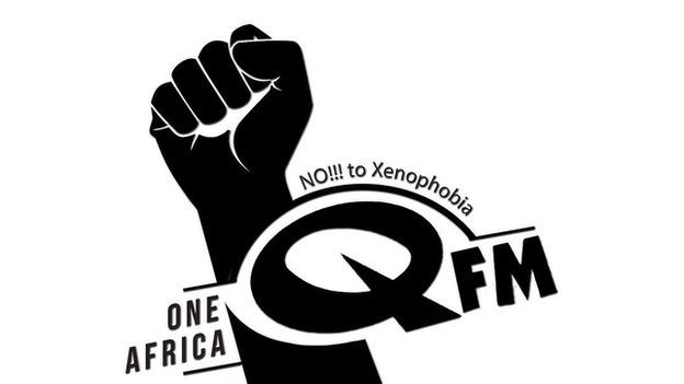 picture of QFM radio logo with no to xenophobia caption