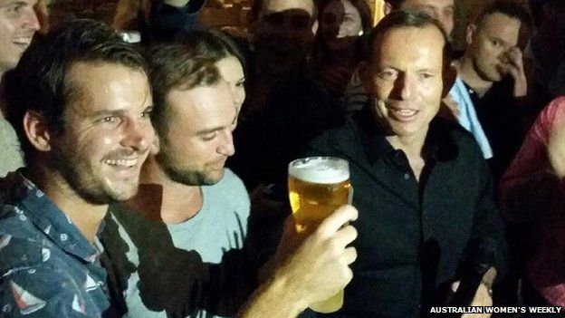 Australian Prime Minister Tony Abbott before downing a pint of beer in Sydney - April 18, 2015