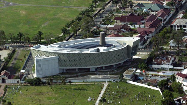 File photo: An aerial shot of central Banda Aceh showing the newly built boat shaped Tsunami museum, 3 April 2009