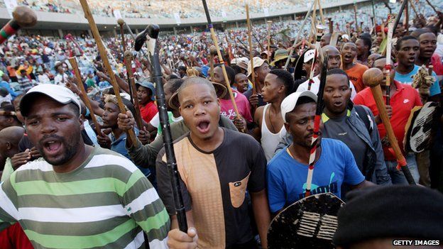 People gather to listen to the Zulu king's speech at the Moses Mabhida Football Stadium in Durban on April 20, 2015