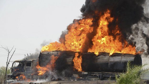 A oil tanker carrying fuel bound for NATO troops in Afghanistan burns after it was attacked near Dera Murad Jamali, Baluchistan province June 8, 2014.
