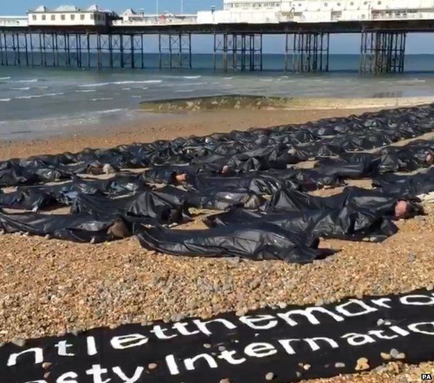 Body bags on Brighton beach