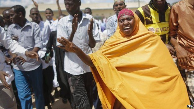 Muslim residents of Garissa chant Down with al-Shabab as they take to the street to protest against attack on the Garissa University College in Garissa town,