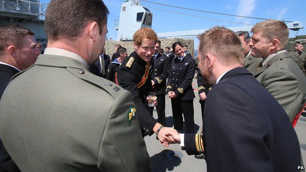 Prince Harry meeting relatives of veterans on board HMS Bulwark, in Turkey's Dardanelles straits