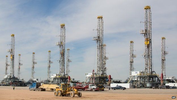 A number of idle oil drilling rigs in Helmerich ^ Payne International Drilling Company"s yard in Ector County, Texas