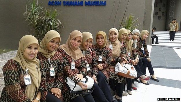 Raihal Fajriah (fifth from right) and other guides at the Aceh Tsunami Museum