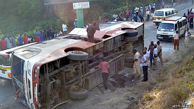 A bus that overturned on the way to the airport in Mombasa.