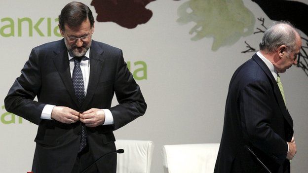 Spanish PM Rajoy (L) with Rodrigo Rato (file pic 2012)