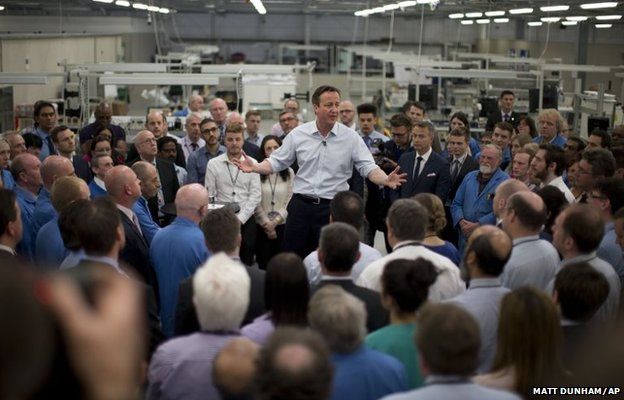 Britain's Prime Minister and leader of the Conservative Party David Cameron makes a speech surrounded by workers during his visit to Kelvin Hughes, a company which manufactures naval tactical radar systems, in north London