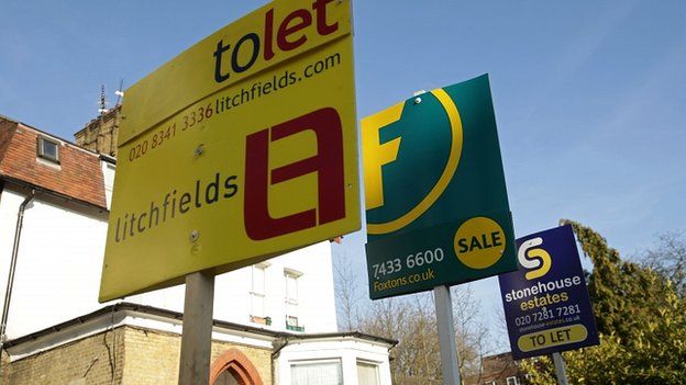 Estate agents' signs offering accommodation to let