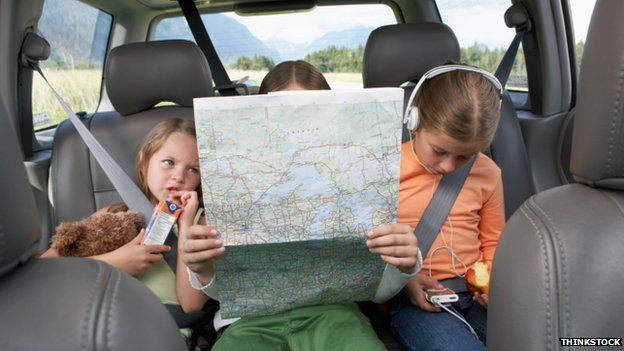 Children reading map