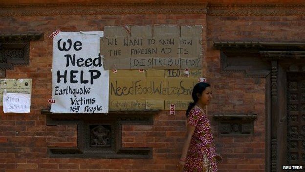 Earthquake victims put up a notice for help on the walls of a temple after last week's earthquake in Bhaktapur, Nepal May 2, 2015.