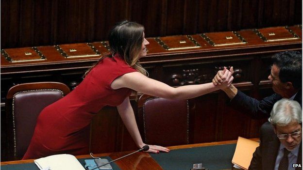 Italian reform Minister Maria Elena Boschi celebrates in parliament after the passage of the government's electoral reform, 4 May 2015